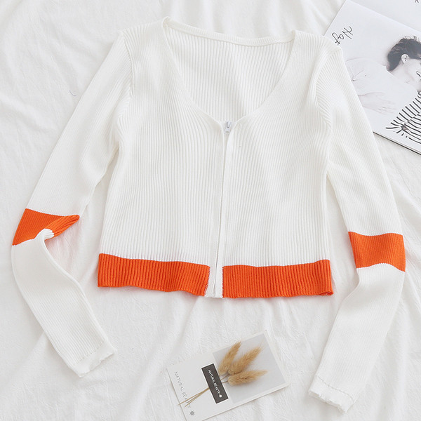 Модерна дамска жилетка в бял и черен цвят с цип