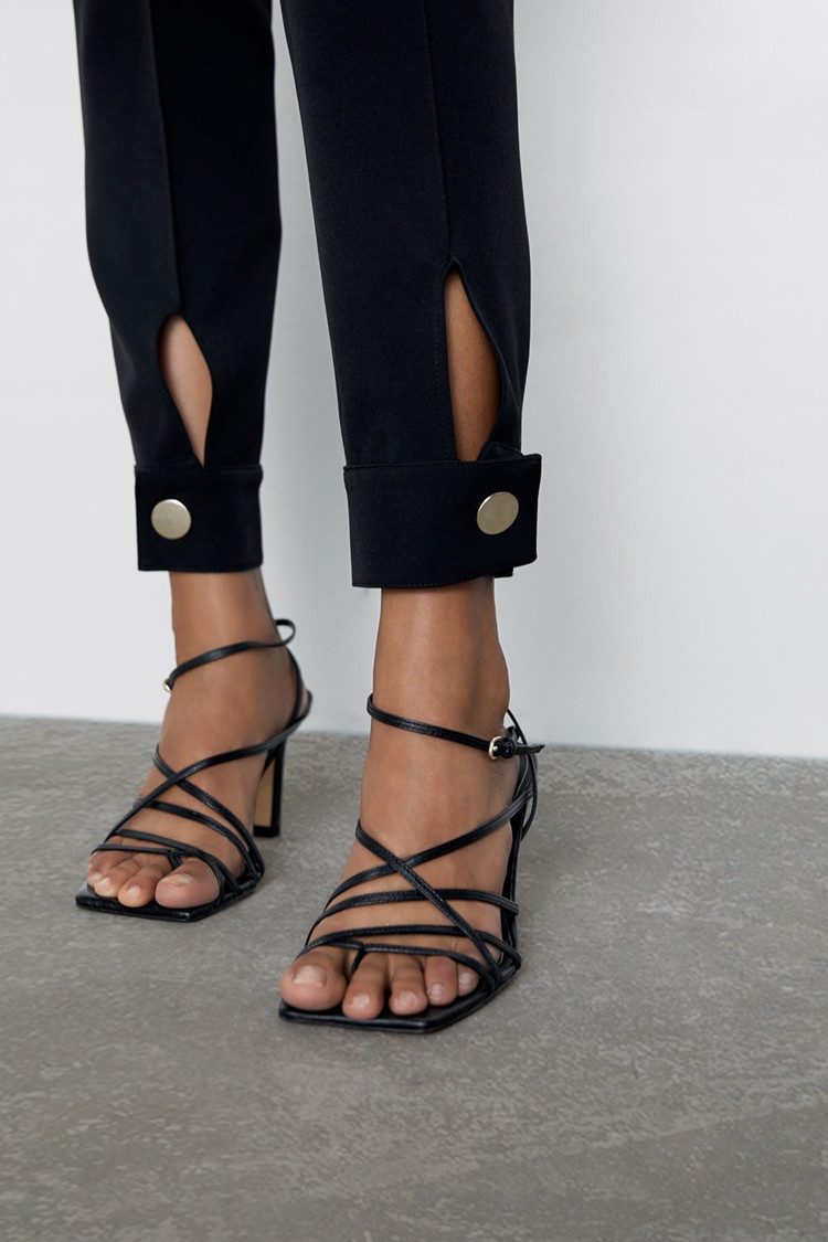 Елегантен дамски панталон с висока талия и ципове в черен цвят