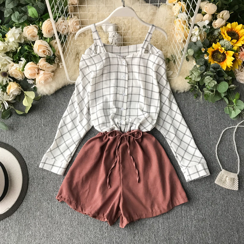 Modern női overall, hosszú ujjal és gombokkal