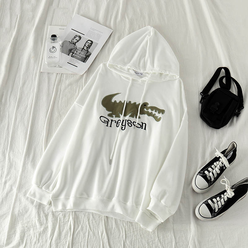 Kapucnival és rátéttel ellátott női pulóver három színben