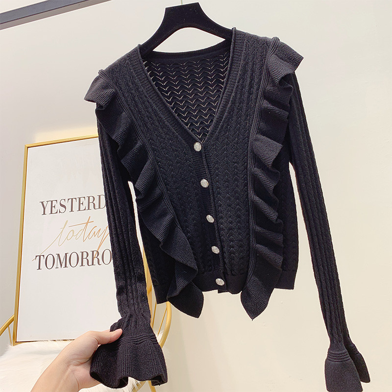 Női pulóver V-nyakkal és gombokkal