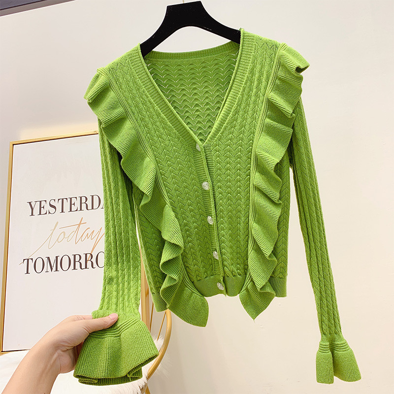 Női pulóver V-nyakkal és gombokkal