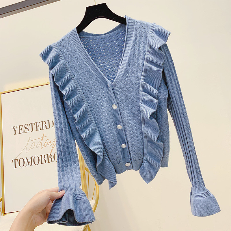 Női pulóver V-nyakkal és gombokkal