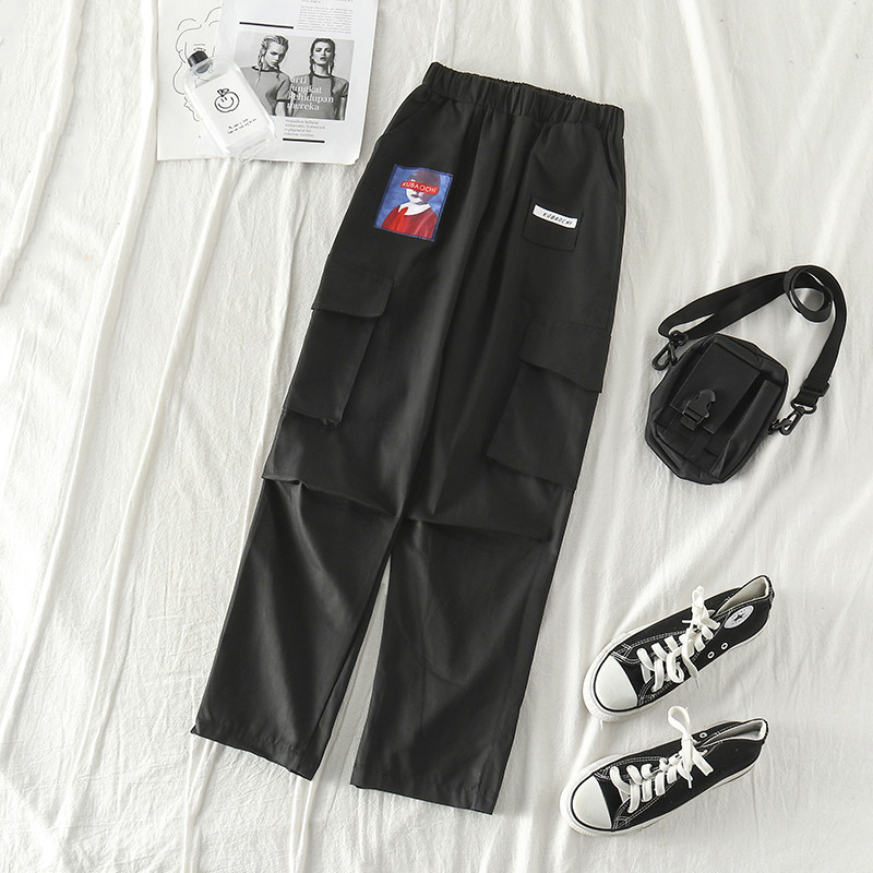 Pantaloni de dama la moda in negru si roz cu aplicatie
