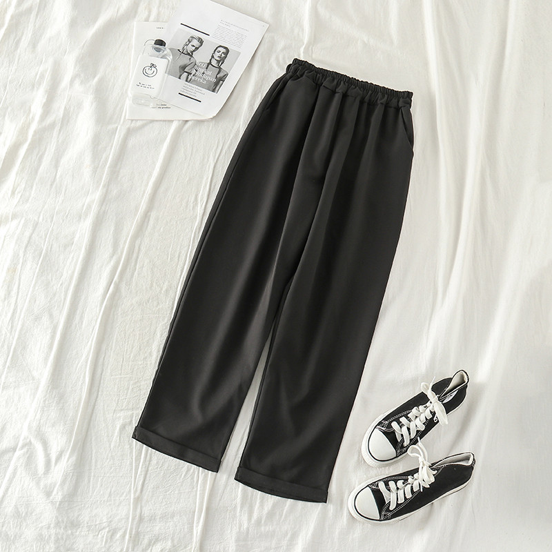 Modern női nadrág gumival fekete és szürke színben