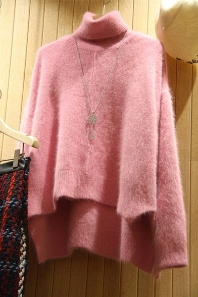 Aktuális női téli pulóver aszimmetrikus modell rózsaszín színben