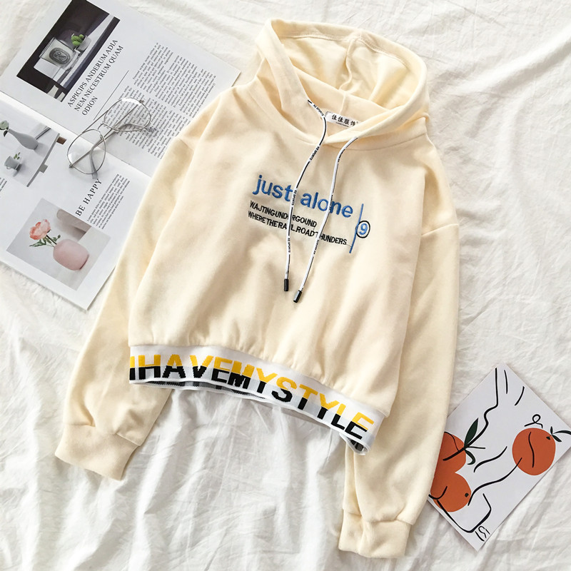 Sport-alkalmi női blúz kapucnival és nyakkendővel, három színben