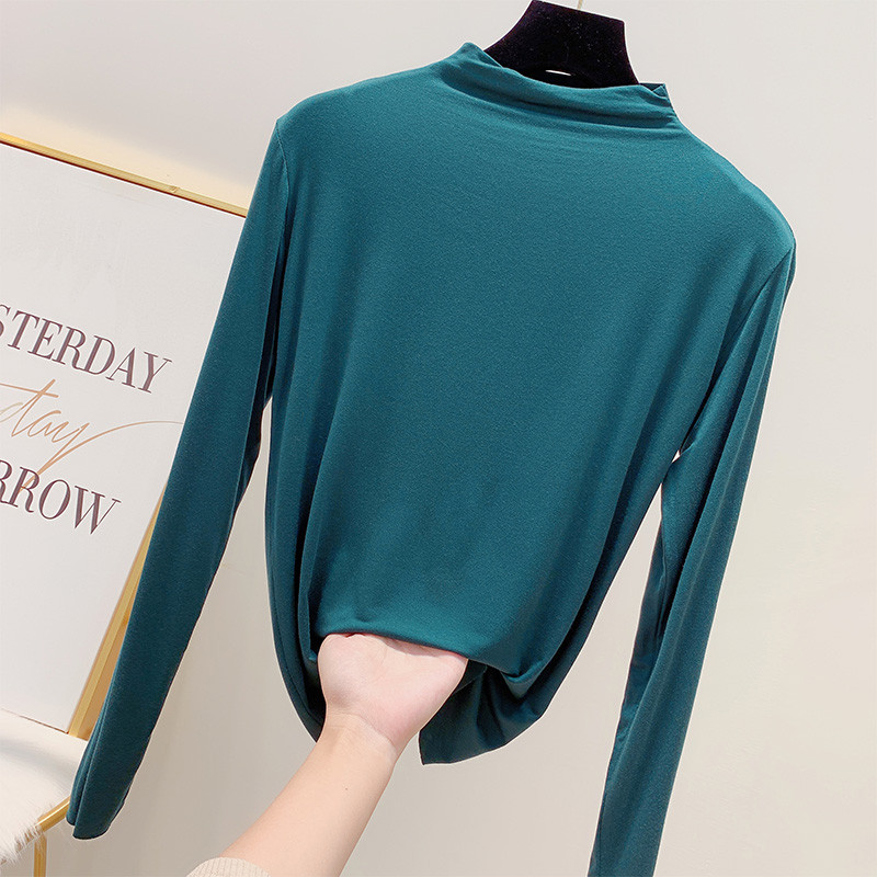 Μοντέρνα  γυναικεία μπλούζα με ψηλό γιακά σε διάφορα χρώματα