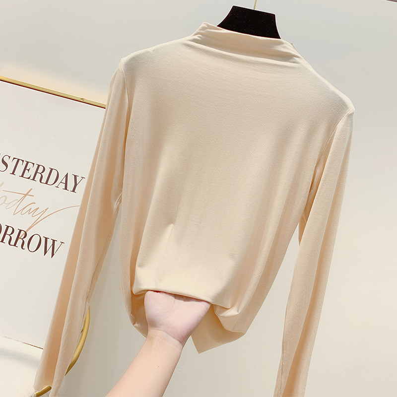 Μοντέρνα  γυναικεία μπλούζα με ψηλό γιακά σε διάφορα χρώματα