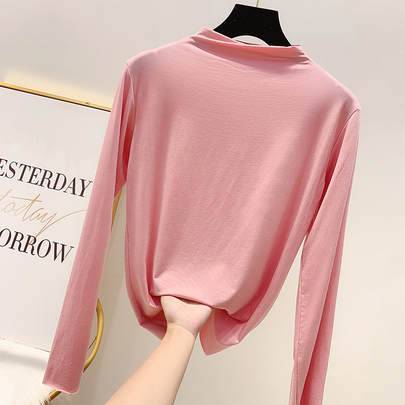 Μοντέρνα  γυναικεία μπλούζα με ψηλό γιακά σε διάφορα χρώματα