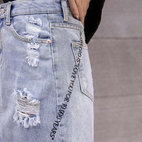 Fusta topică de damă în albastru cu motive rupte