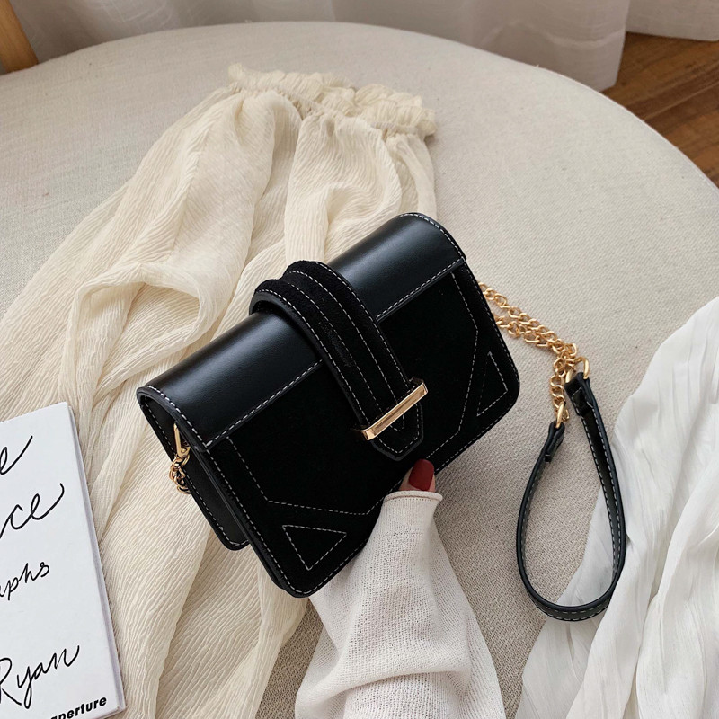 Geanta de dama din piele intoarsa cu inchidere metalica in mai multe culori