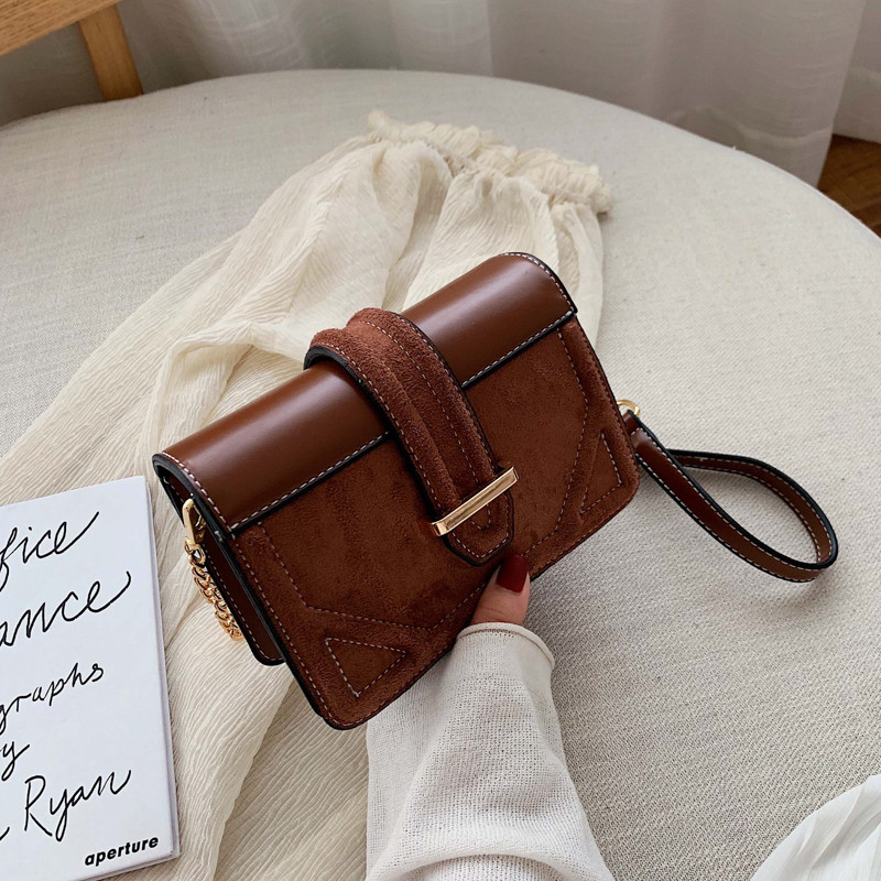 Geanta de dama din piele intoarsa cu inchidere metalica in mai multe culori