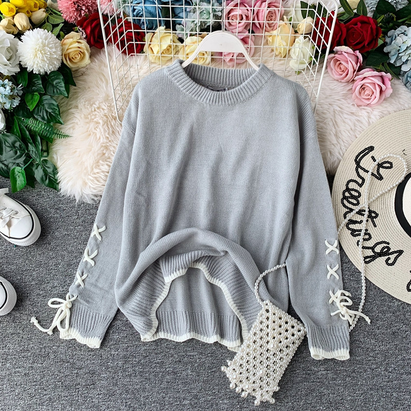 Modern női pulóver, ujján megkötős, többféle színben