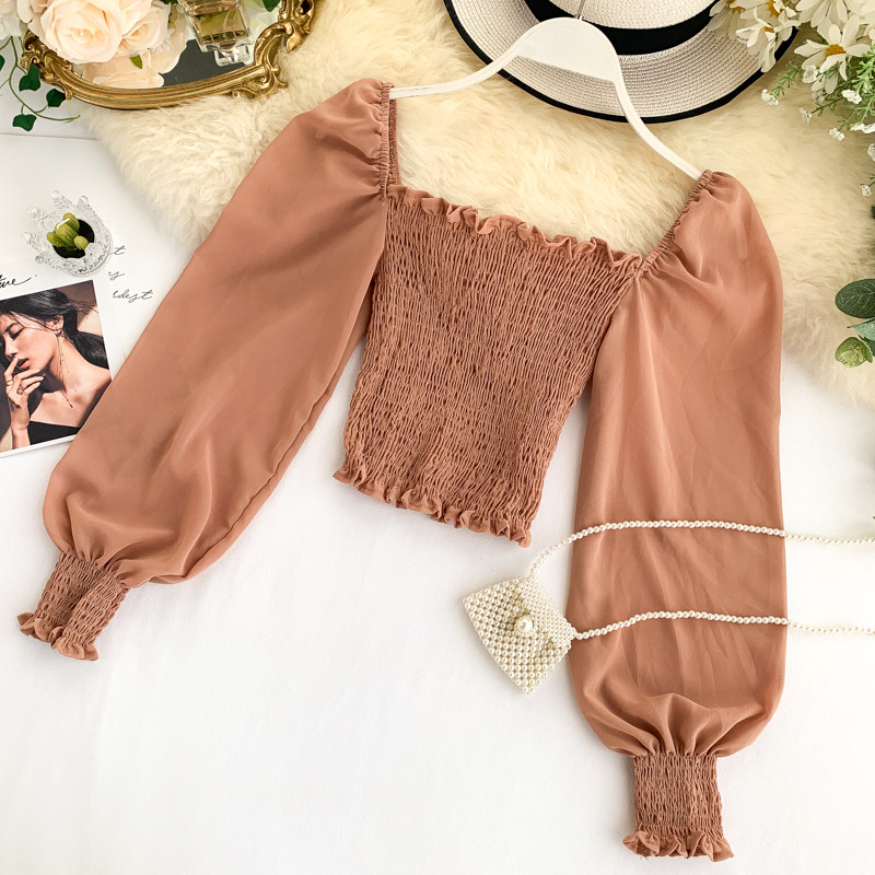 Női blúz különböző színekben és hosszú ujjal