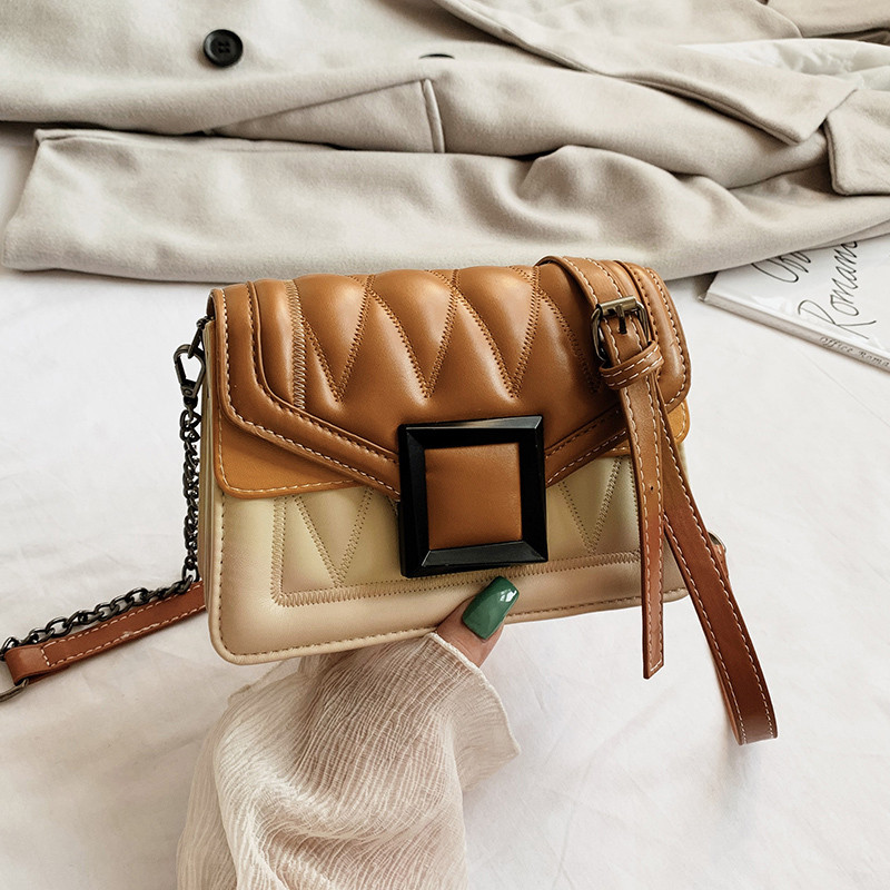 Geanta de dama din piele ecologica cu inchidere metalica