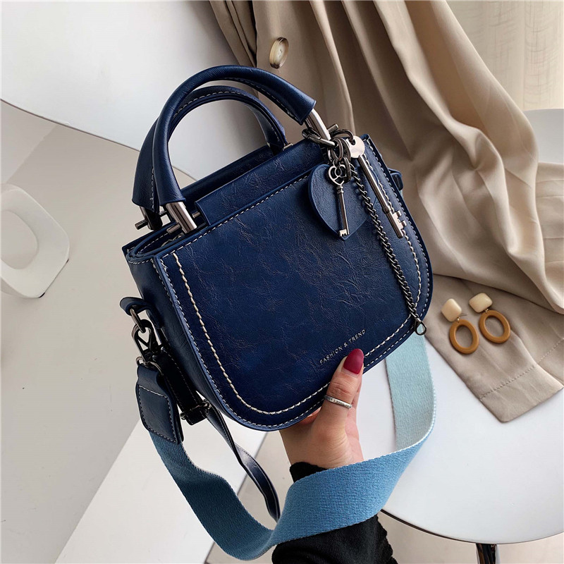 Geanta dama cu maner scurt si lung si decor metalic