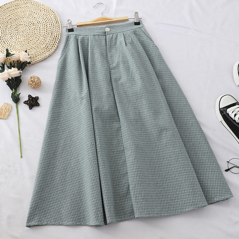 Μοντέρνα γυναικεία φούστα σε τέσσερα χρώματα με κομμένα μοτίβο