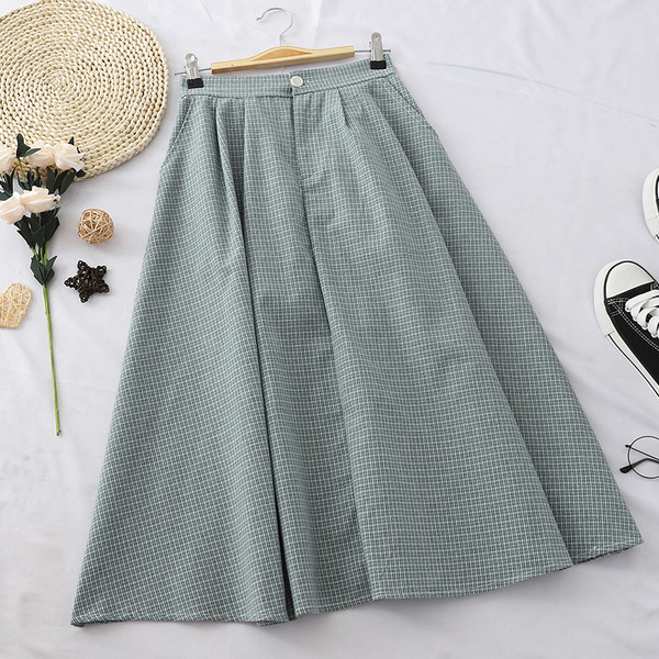 Μοντέρνα γυναικεία φούστα σε τέσσερα χρώματα με κομμένα μοτίβο