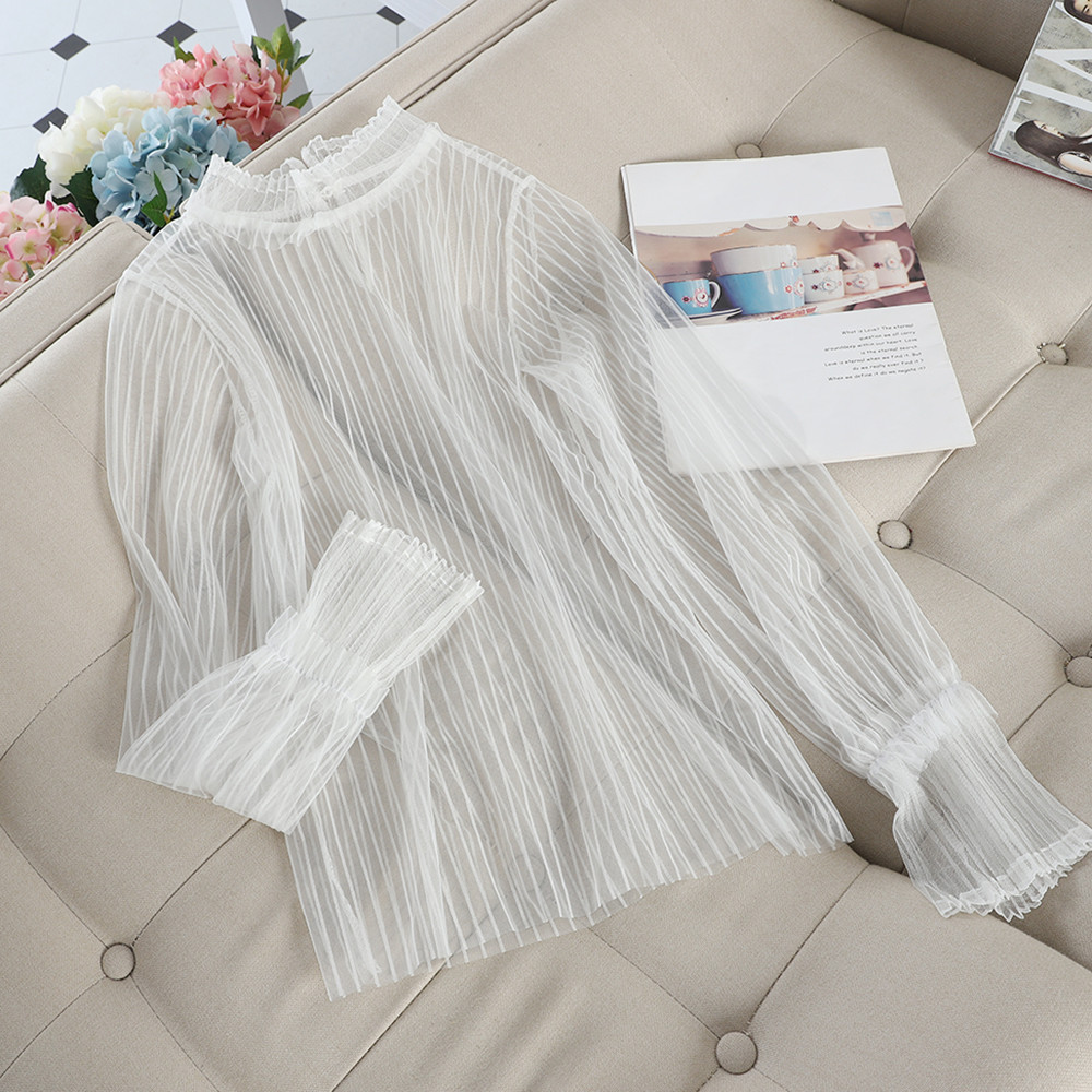 Bluză de damă modernă în negru, alb și bej, cu nasture și mâneci lungi