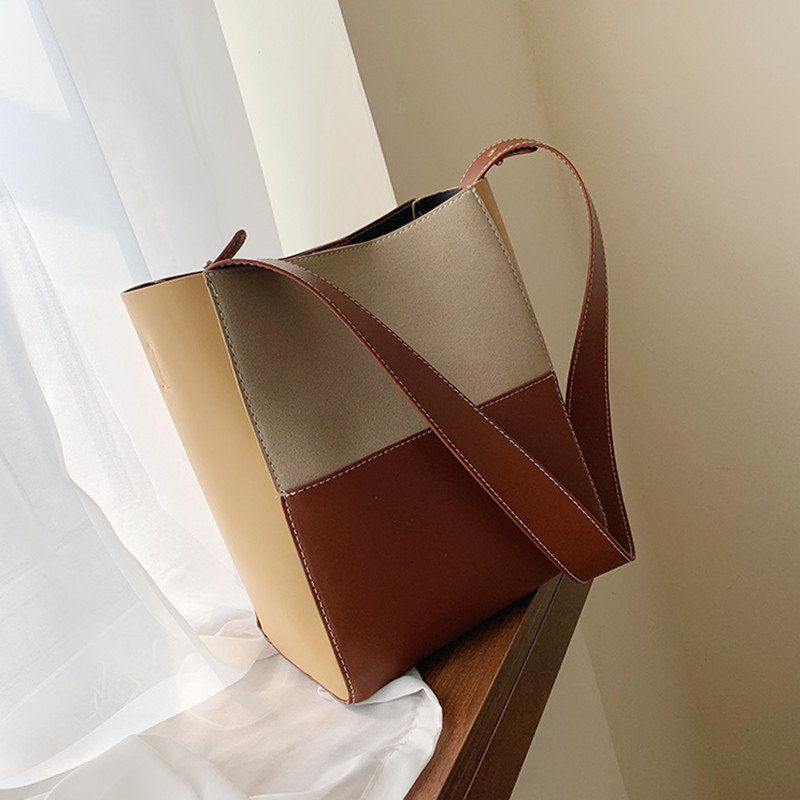 Női bőr táska hosszú füllel több színben