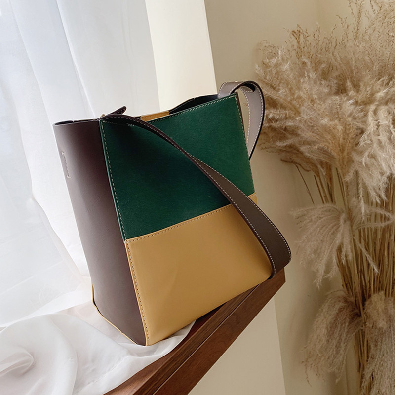 Női bőr táska hosszú füllel több színben