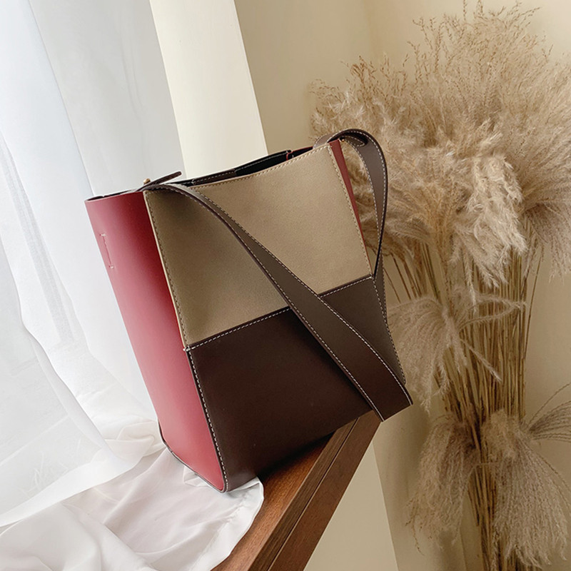 Női bőr táska hosszú füllel több színben