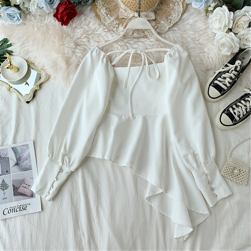 Bluză de damă elegantă model asimetric în alb-negru