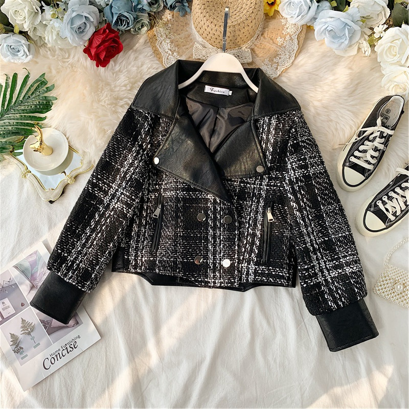 Μοντέρνο γυναικεία μπουφάν με τσέπες σε μαύρο και άσπρο χρώμα