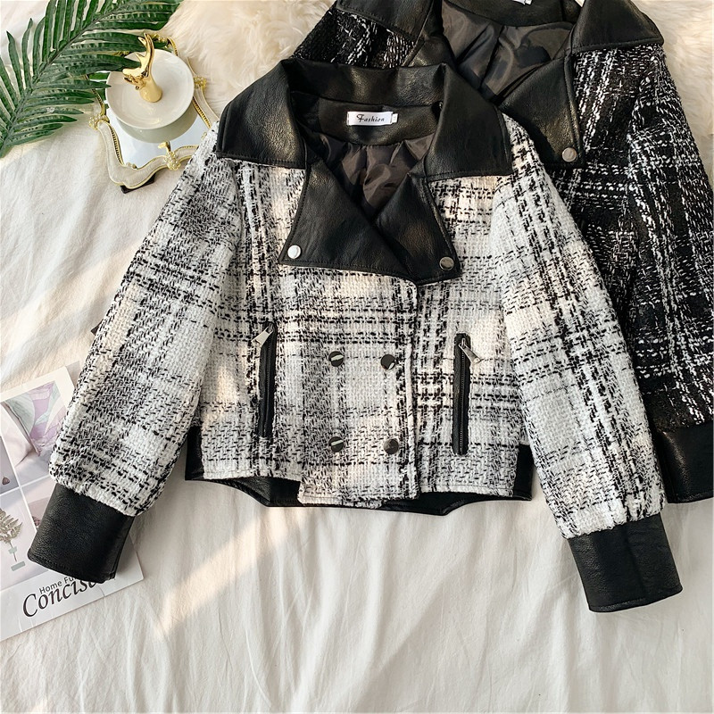 Μοντέρνο γυναικεία μπουφάν με τσέπες σε μαύρο και άσπρο χρώμα