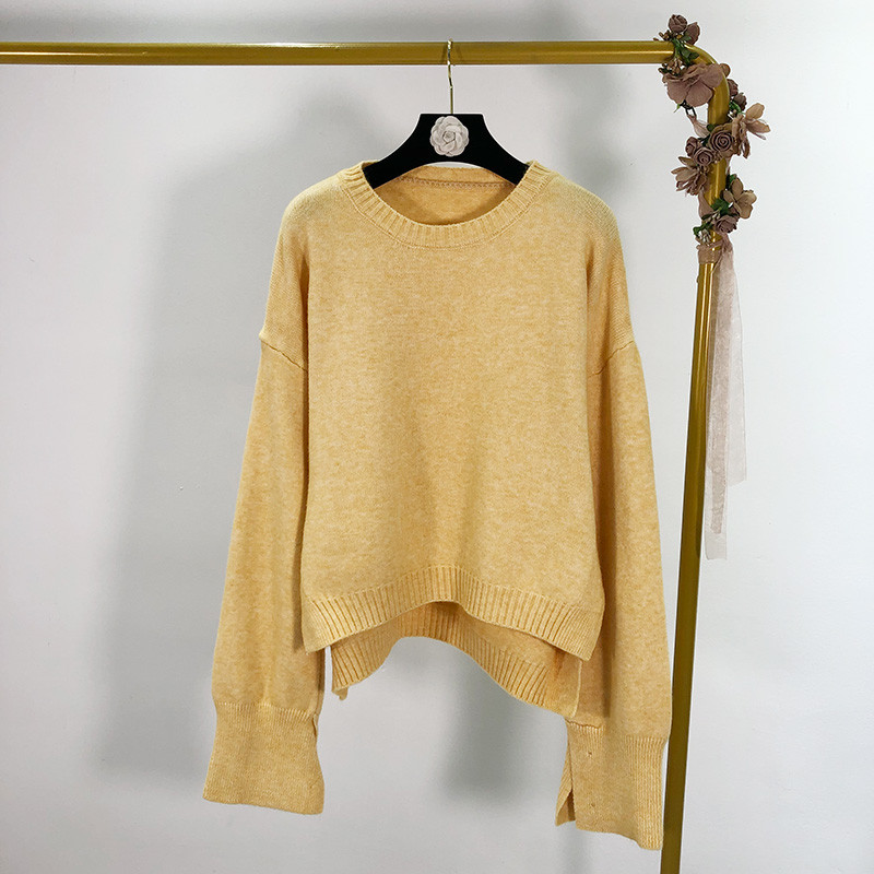 Ευρύ γυναικείο πουλόβερ  με πλαϊνές τσέπες σε τέσσερα χρώματα