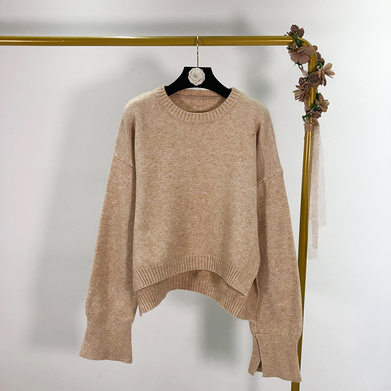 Ευρύ γυναικείο πουλόβερ  με πλαϊνές τσέπες σε τέσσερα χρώματα