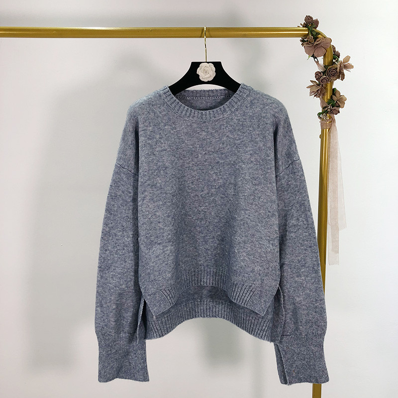 Ευρύ γυναικείο πουλόβερ  με πλαϊνές τσέπες σε τέσσερα χρώματα