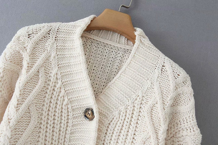 Rövid női mellény fehér és zöld színben, gombokkal