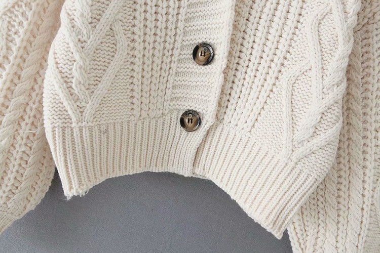 Rövid női mellény fehér és zöld színben, gombokkal