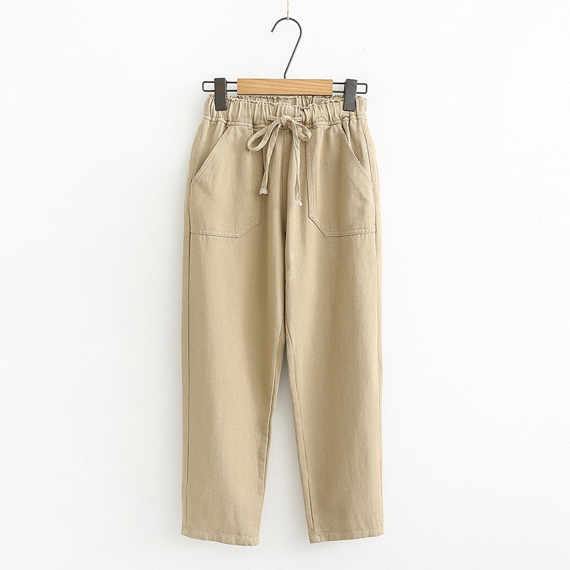 Μοντέρνα γυναικεία παντελόνια με ελαστική μέση, τσέπες και κορδόνια σε λευκό, μαύρο και καφέ χρώμα