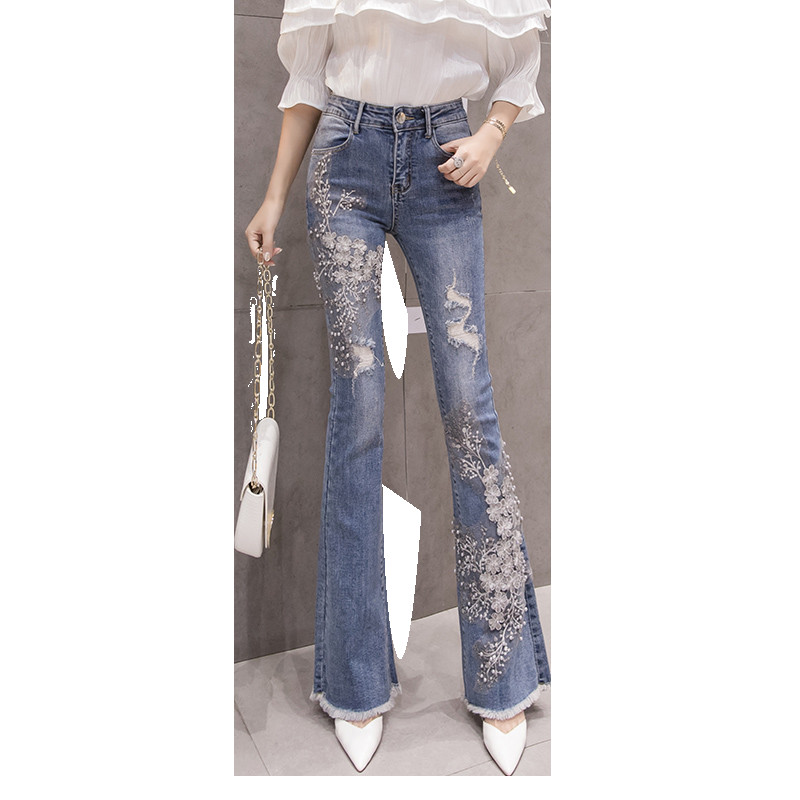 Μοντέρνα γυναικεία τζιν με διακοσμητικές πέρλες και κεντήματα