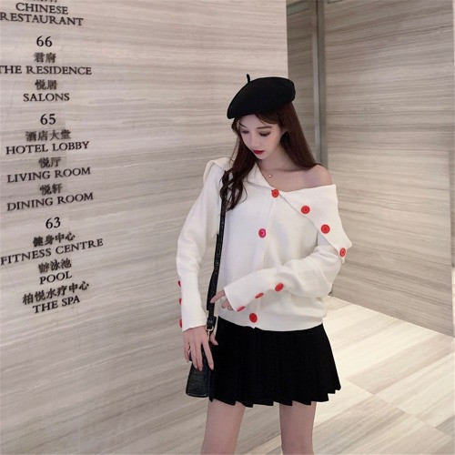 Női kardigán színes gombokkal, fehér és fekete színben