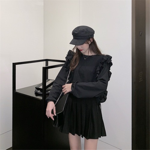 Bluză de damă cu mâneci lungi în alb și negru