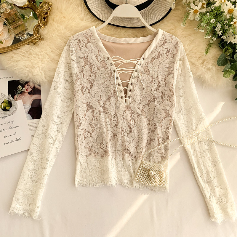 Bluză de damă elegantă cu dantelă și cravate în alb-negru