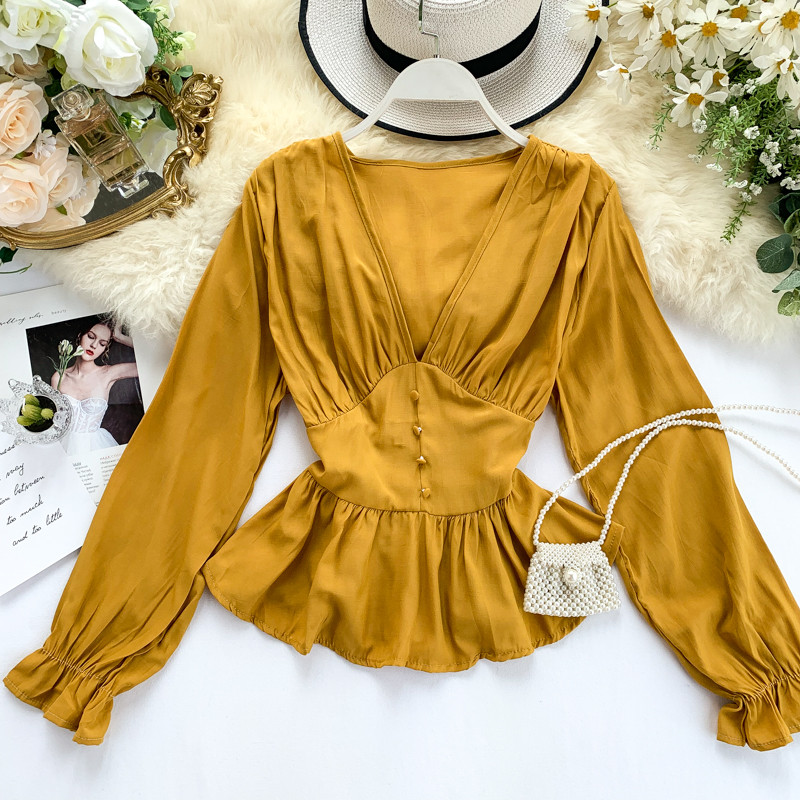 Γυναικεία μοντέρνα  μπλούζα με μακριά μανίκια