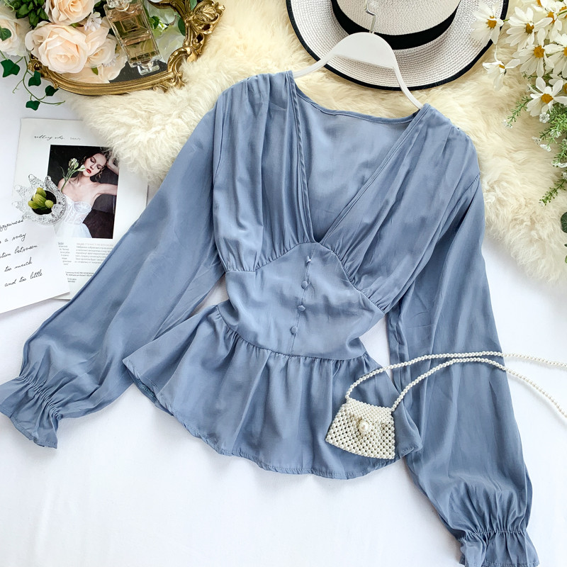 Γυναικεία μοντέρνα  μπλούζα με μακριά μανίκια