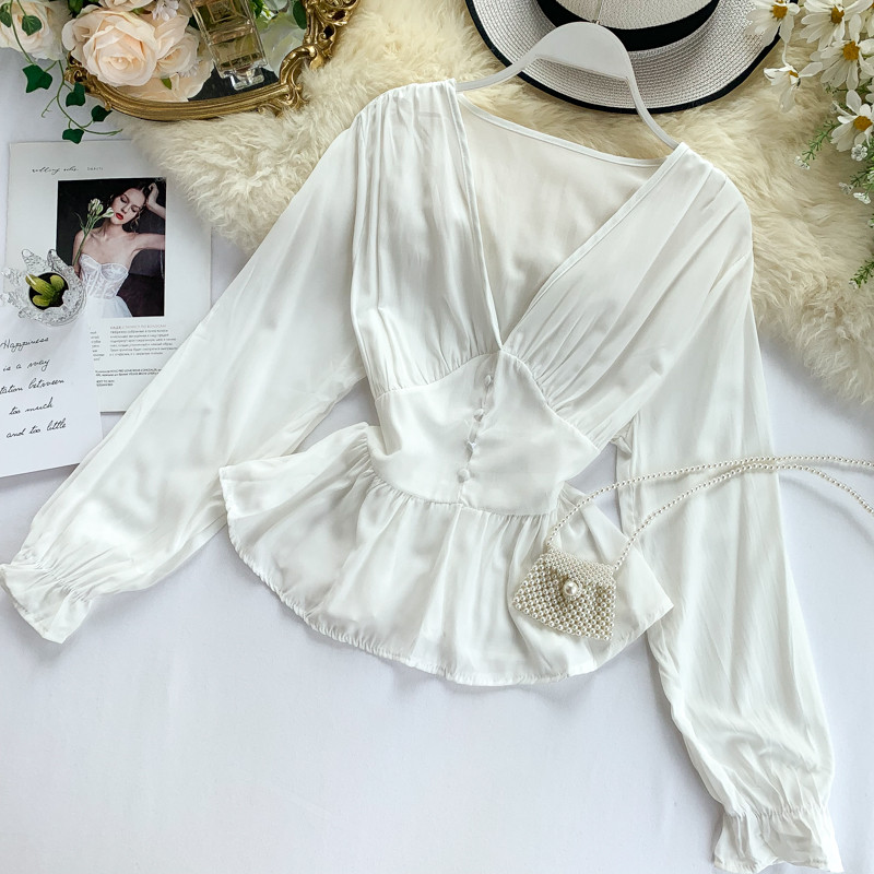 Γυναικεία μοντέρνα  μπλούζα με μακριά μανίκια