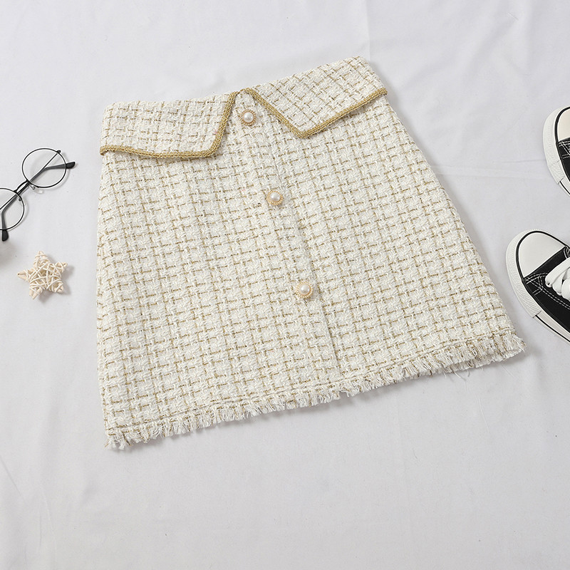 Aktuális női szoknya négy színben, gombokkal