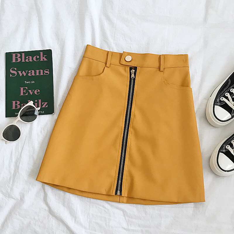 Modern női szoknya fekete és sárga színben, cipzárral