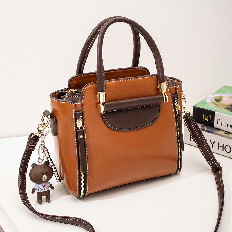 Modern női táska két füllel több színben