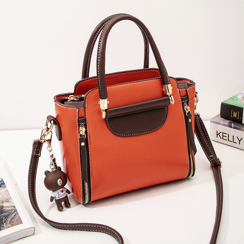 Modern női táska két füllel több színben