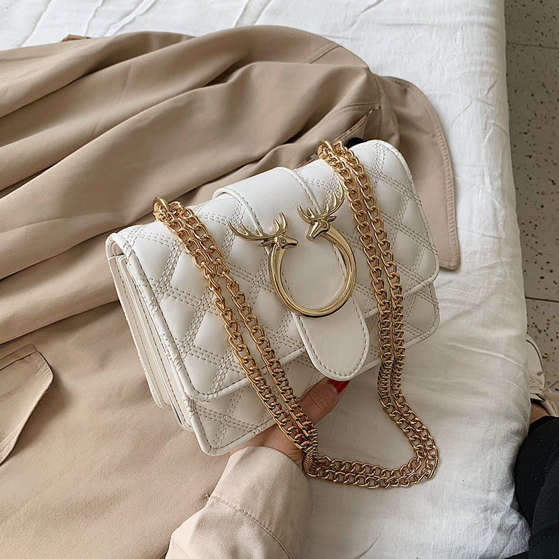 Geanta de dama eleganta cu inchidere metalica in mai multe culori