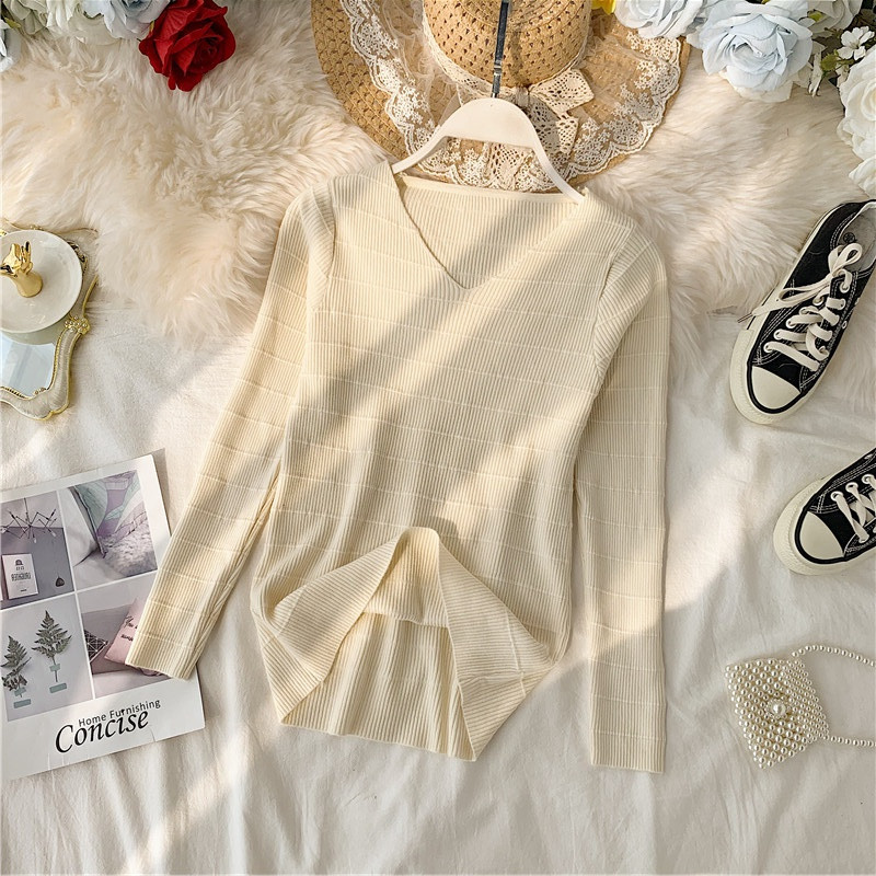 Női pulóver sima modell spitz nyakkivágással, különböző színekben