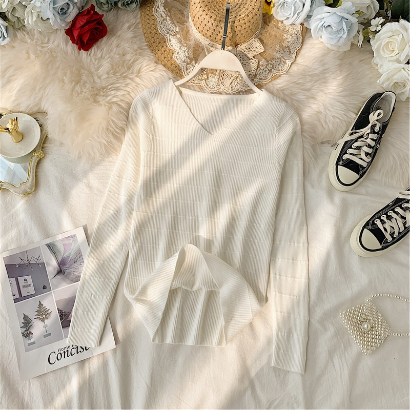 Női pulóver sima modell spitz nyakkivágással, különböző színekben